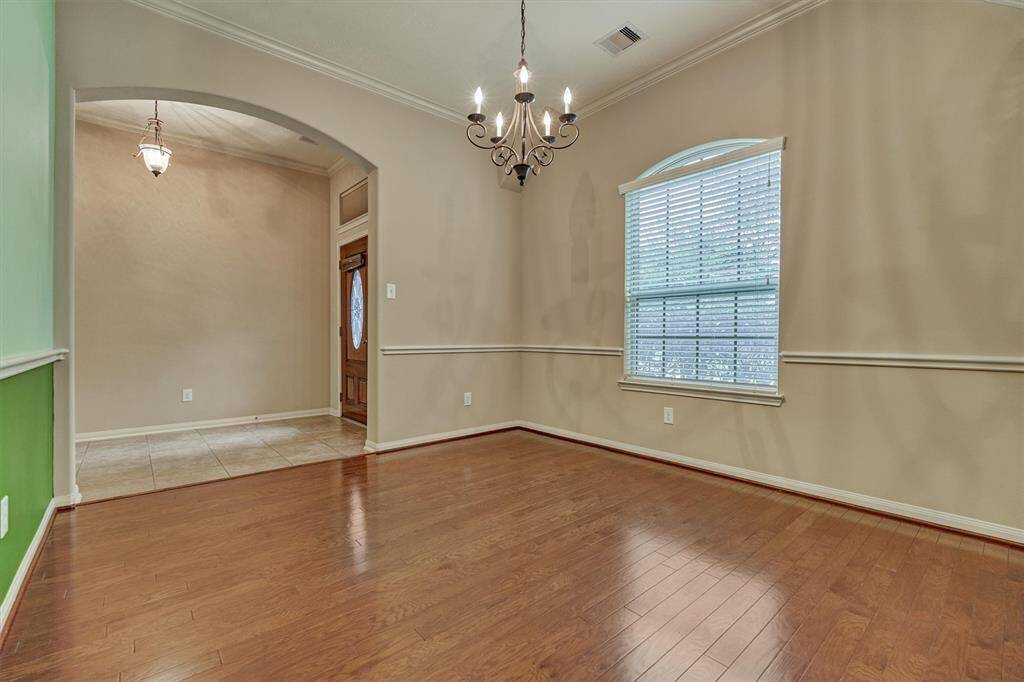View from the formal living room to the foyer and front door.