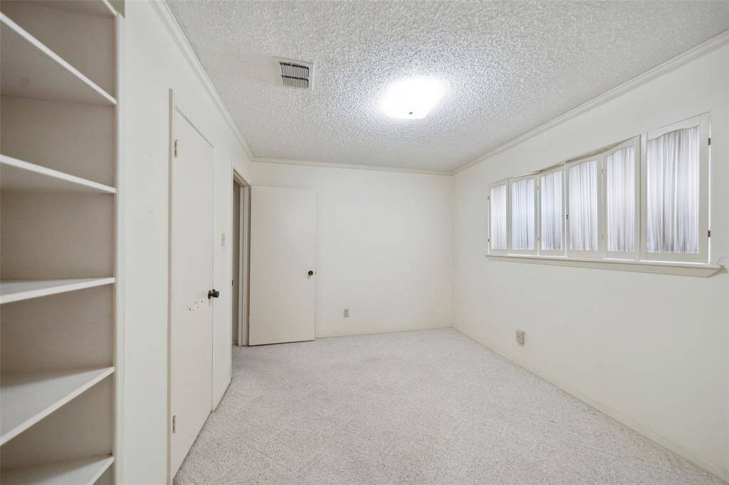 Bedroom 2 with walk-in closet and built-ins