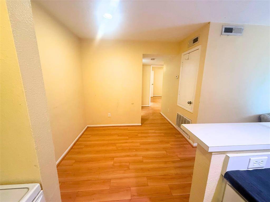 Your dining area immediately adjacent to the kitchen is spacious and well lit.