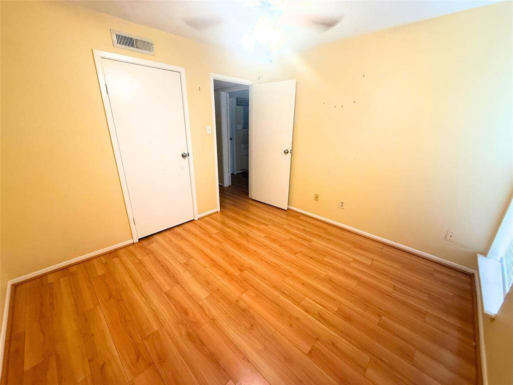 First bedroom has room enough for multiple bed sizes and is adjacent to the first bathroom.