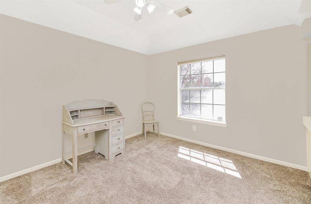 Second bedroom upstairs also has the raised ceilings and ceiling fan.