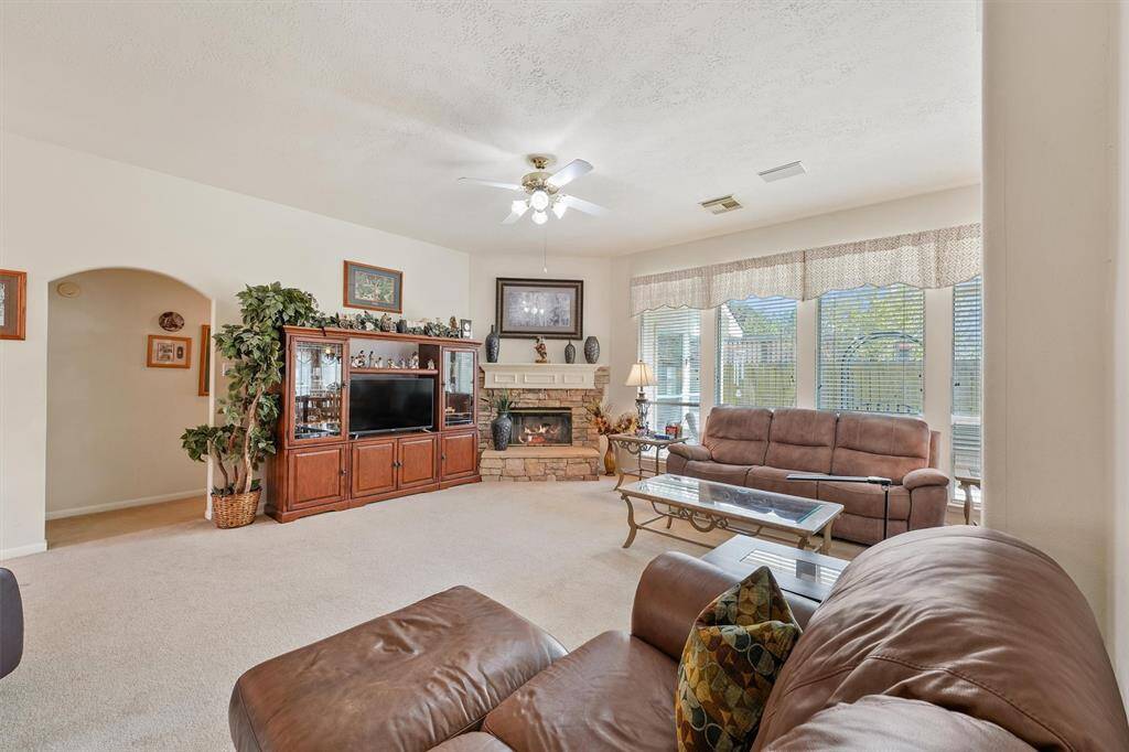 Family room at another angle, with a great view of the fireplace.