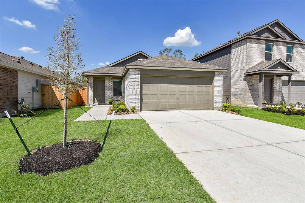 Paved walkway from your twocar garage with remote controlaccess and double wide driveway.
