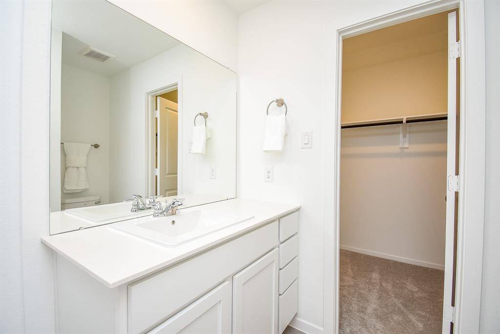 Continuing on to your en-suite primary bathroom with plenty of space for you and your partner to share.