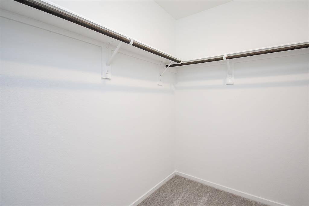 Large walk in closet in theprimary for all your seasonalwear.
