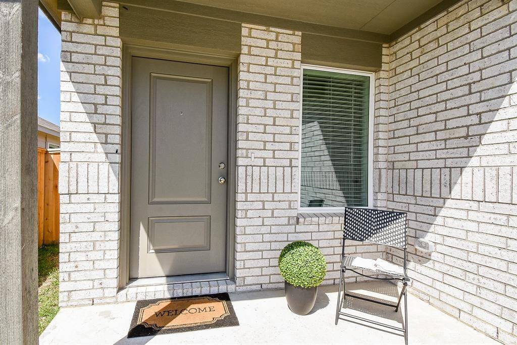 Covered entryway porch madesafe for all your Amazonpackages and for your friendsand family to dive under on arainy day.