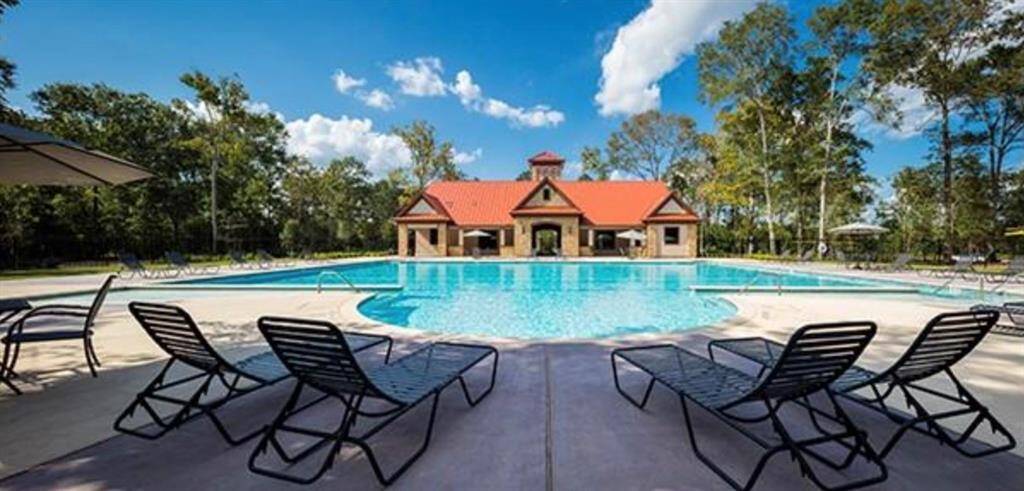 Enjoy hot summer days relaxingat the pool while the kids splashand play!