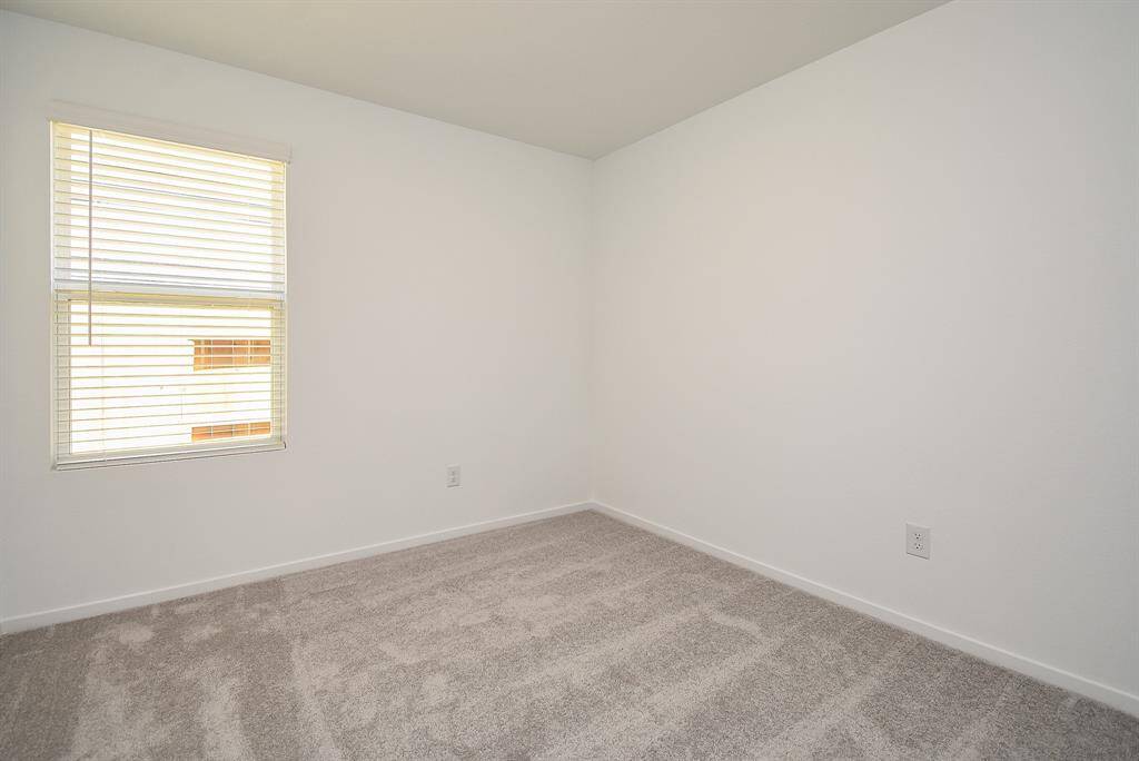 One of the three secondarybedrooms all great sizes, all withcozy carpet, recessed lightingand fresh paint.