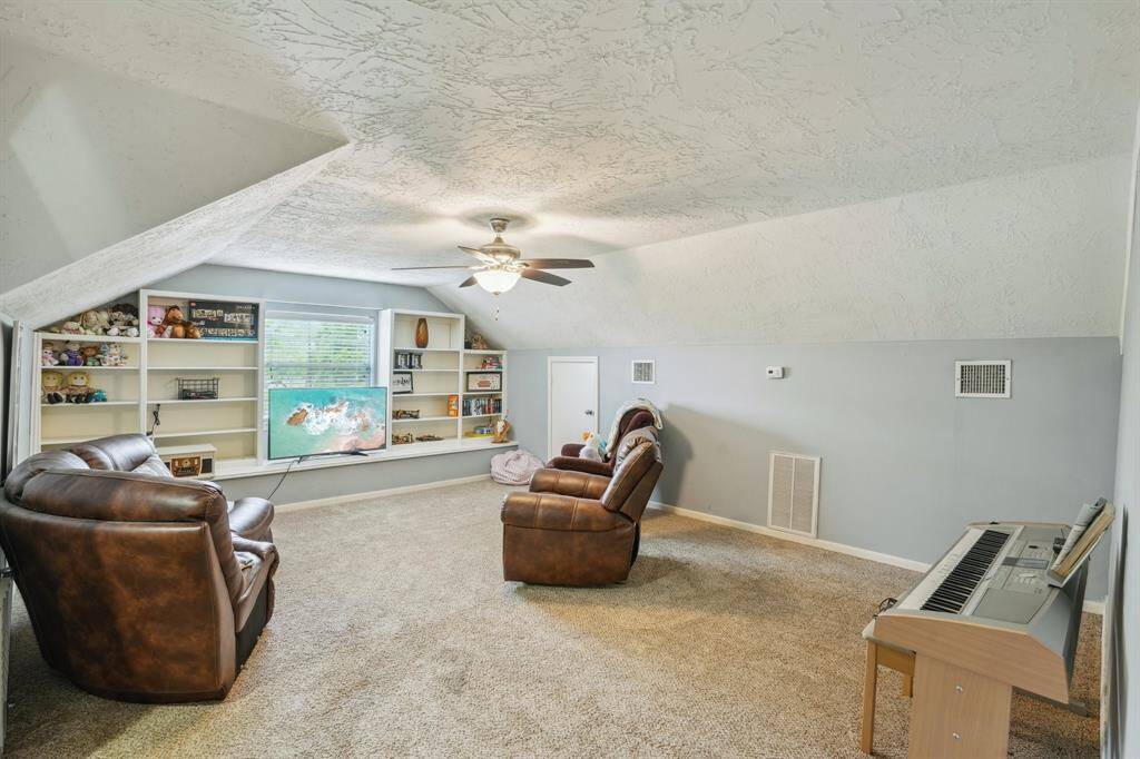 upstairs Game room with built in