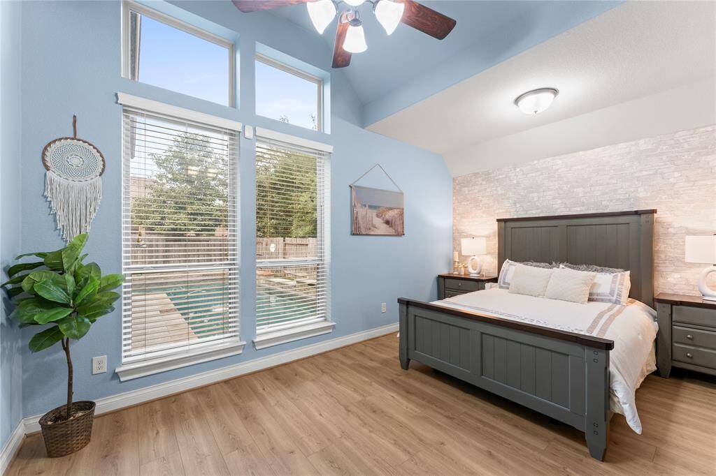 The fourth room with the view of the swimming pool and the accent wall.