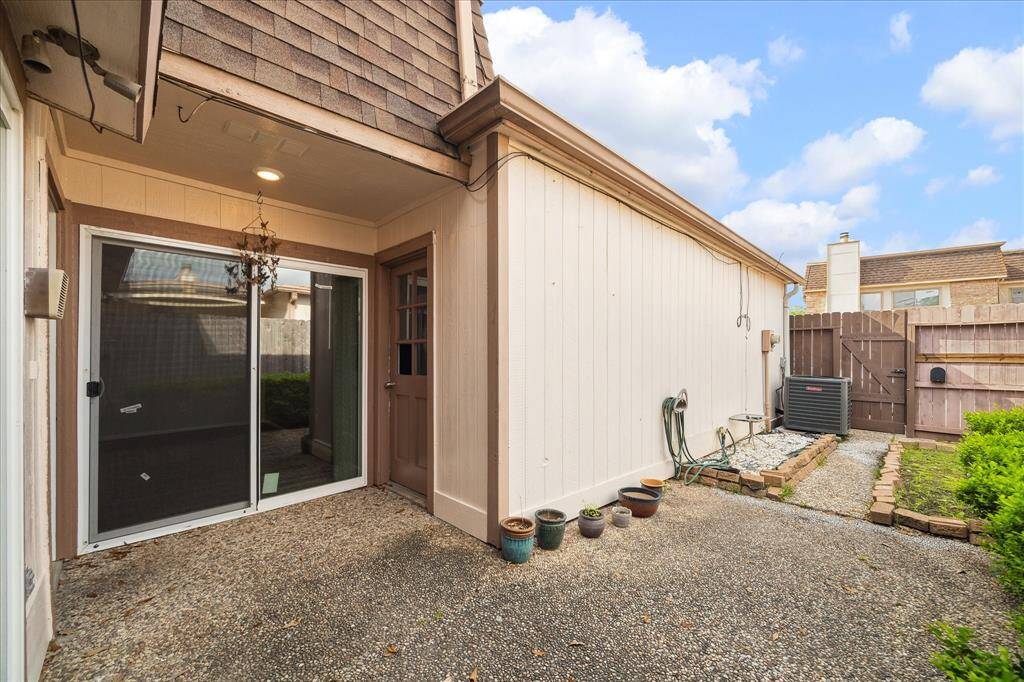Back patio, and garage is the the left.