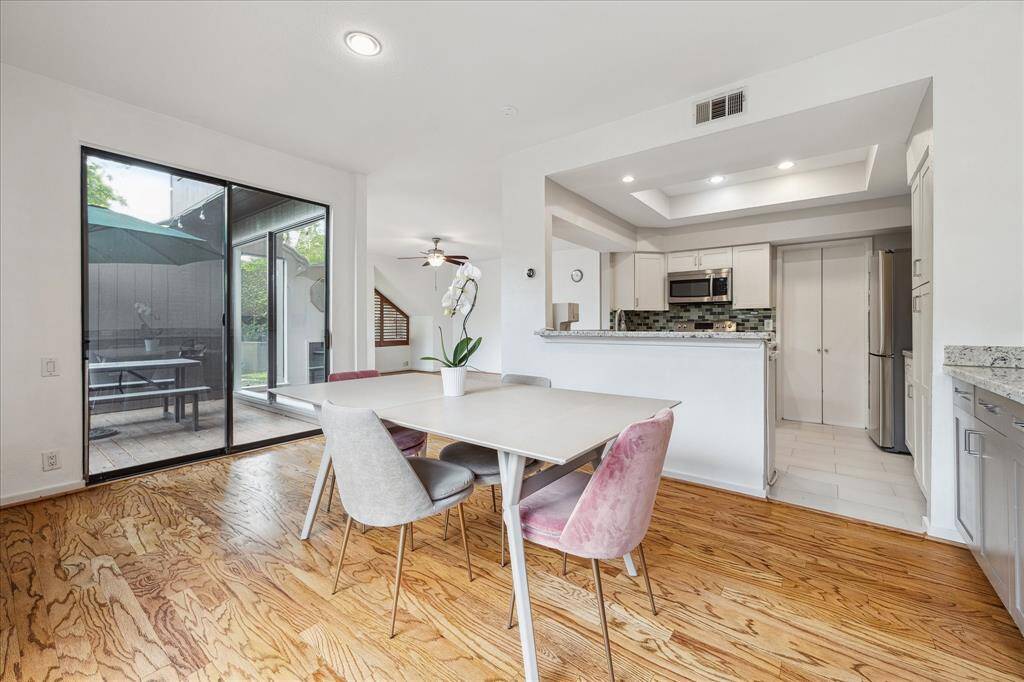 Dining area off of the kitchen with a built-in buffet with additional storage