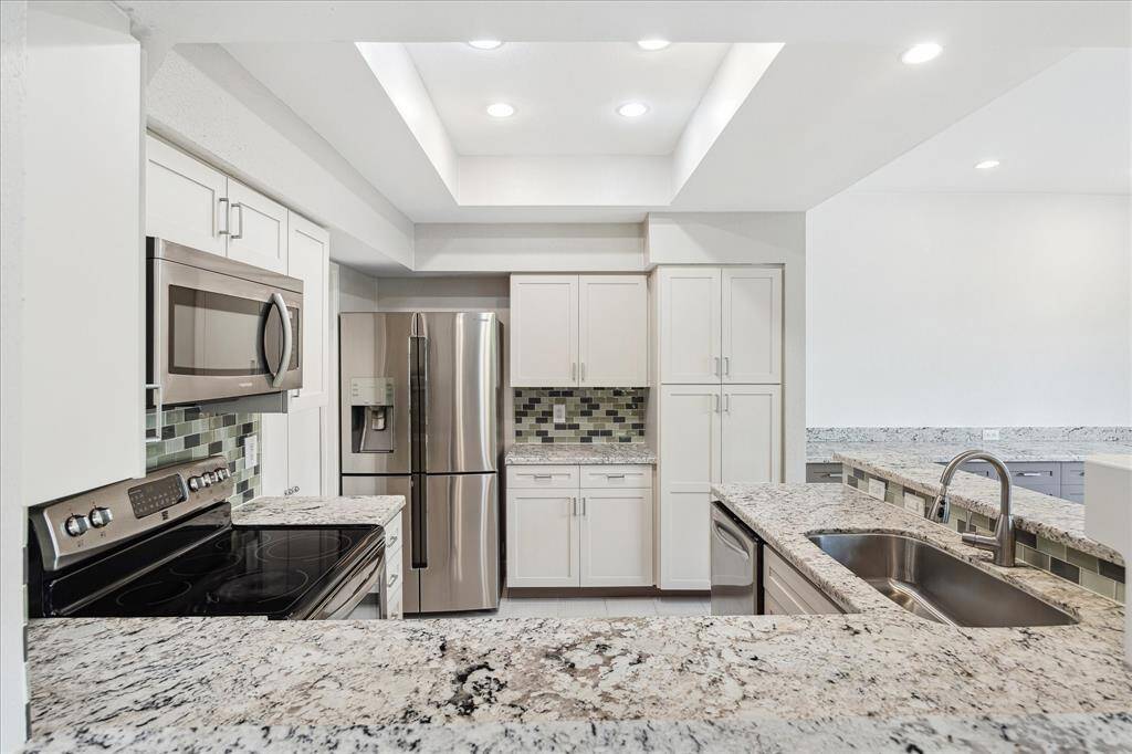 Another view of the this light & bright kitchen