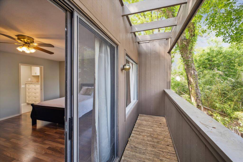 View of balcony off of the primary bedroom