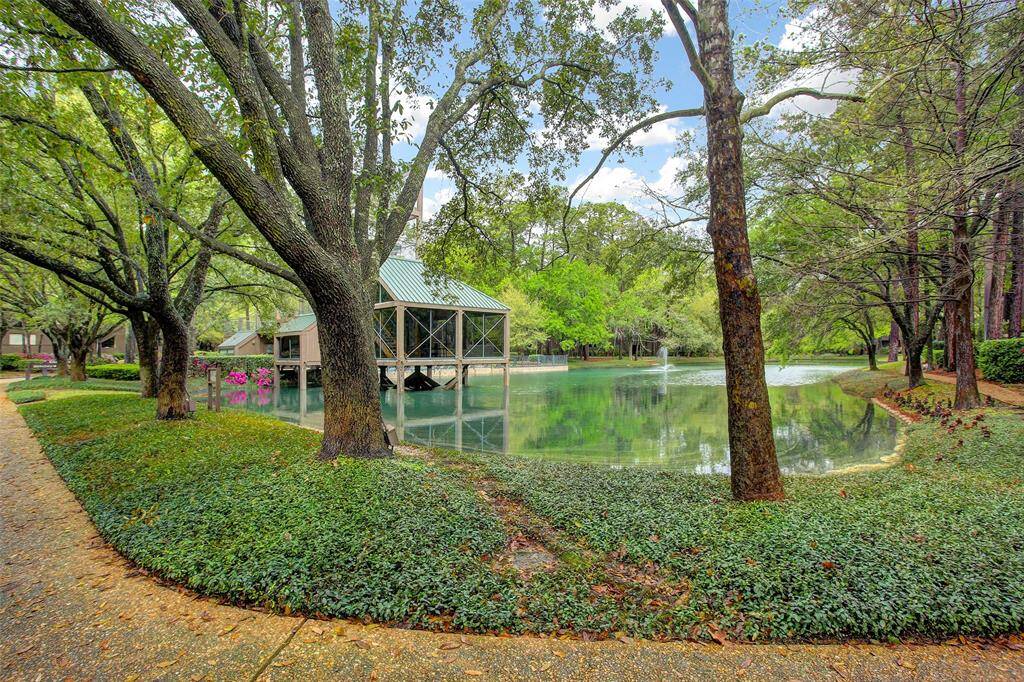 View of the clubhouse, lake and trails...such a peaceful retreat!