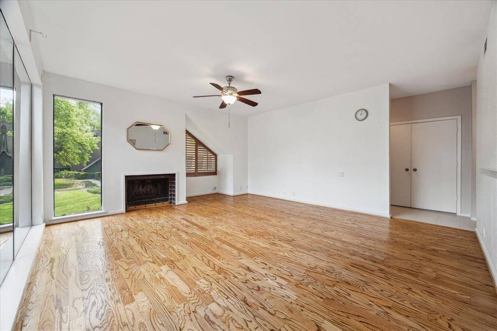 An open-concept floor plan full of natural light with large windows is found on the first floor.  Plus, there are two large storage closets downstairs.