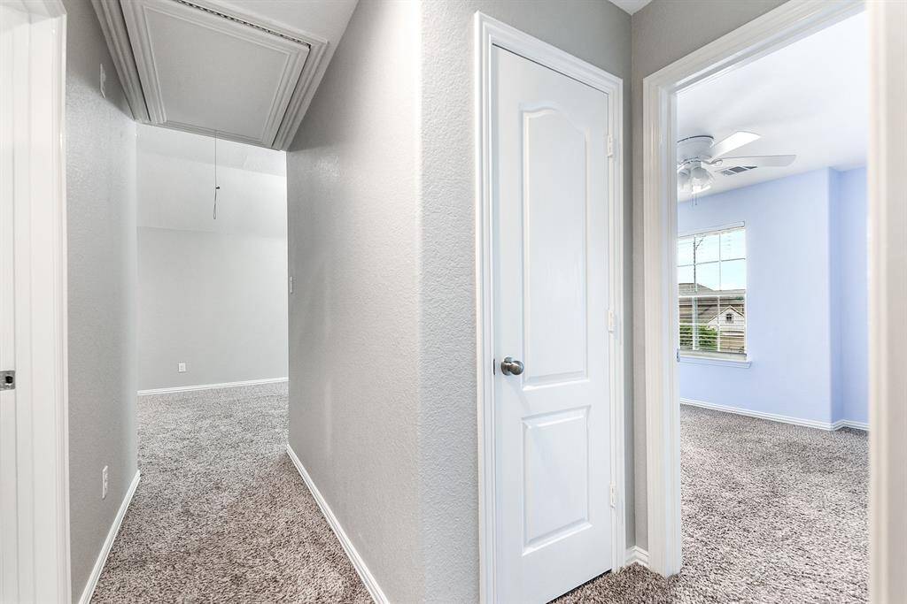 Linen closet and view into the gameroom.