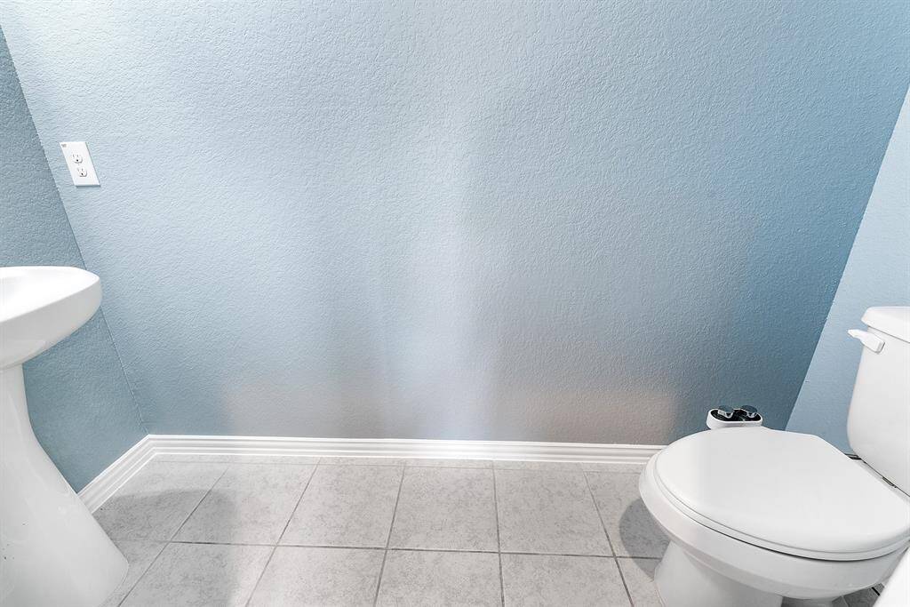 Half bath located downstairs.