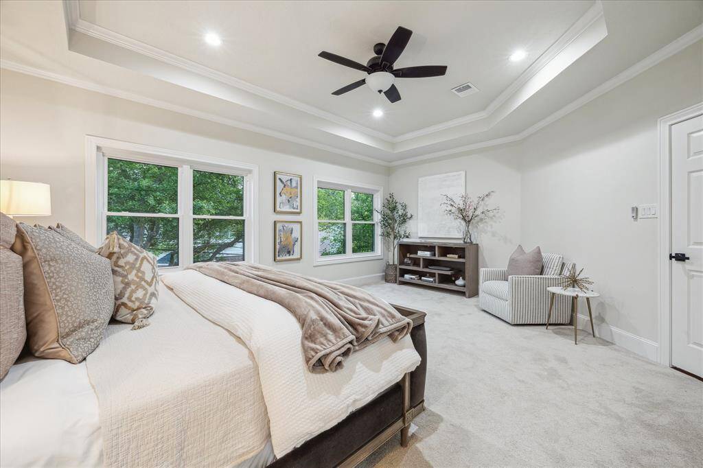A serene retreat, offering a generous sitting area that creates the perfect spot for relaxation or reading. This thoughtfully designed sanctuary combines comfort and style, providing a peaceful haven to unwind at the end of the day.