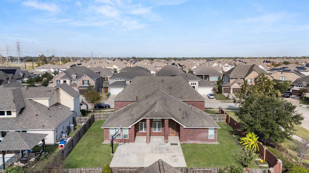 An additional aerial view showcasing the home's ideal location within the Riverstone community!