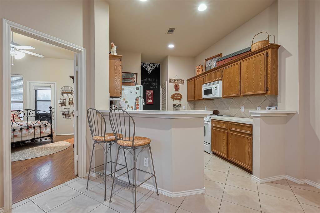 breakfast bar overlooks kitchen