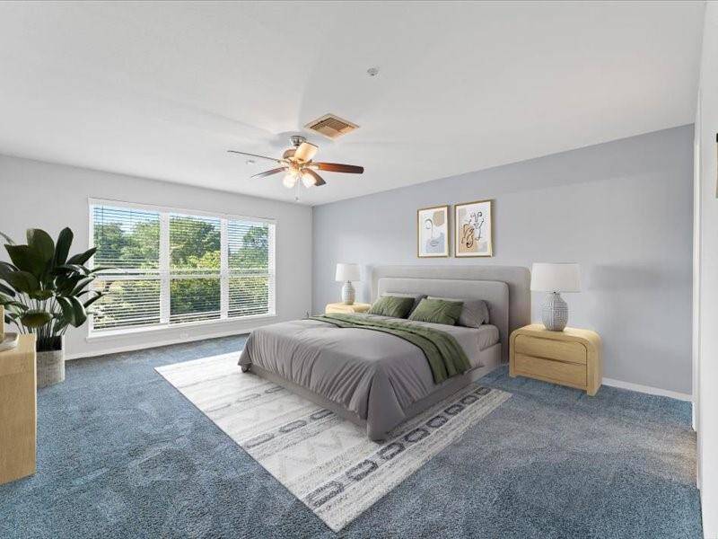Serenity space & unwind after long day in Primary suite!! This Primary suit is very spacious enough with warm paint,High ceilings, Large window. and ceiling fans.