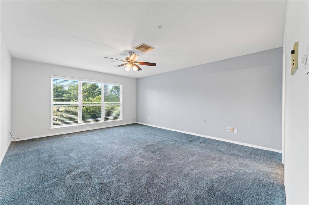 Plush carpet in all Bedrooms with ceiling fans. Big closet with extra shelves.