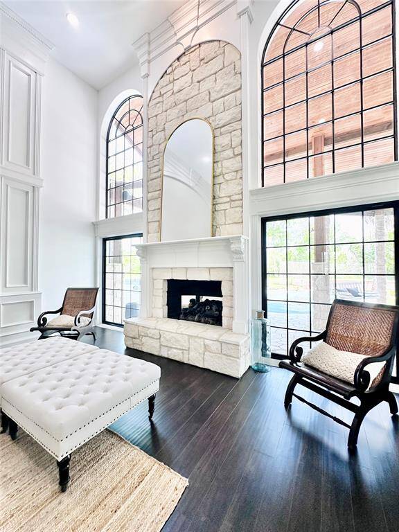 Wood burning fireplace is the centerpiece of living room and the first thing you see when you enter the front door of the home.