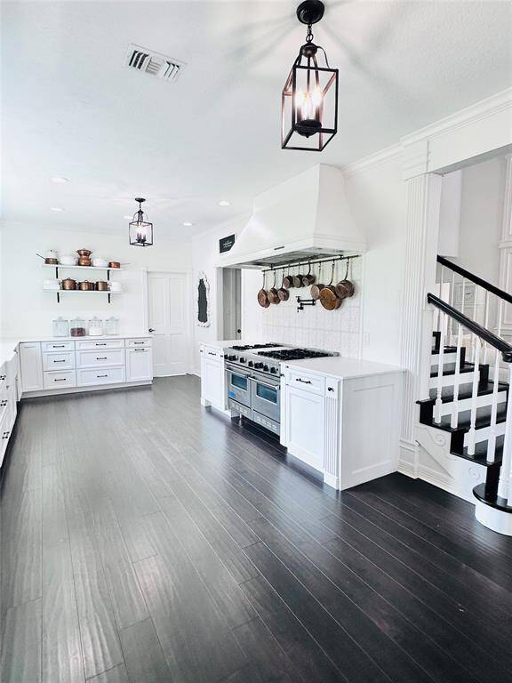 Kitchen is welcoming with beautiful finishes throughout.