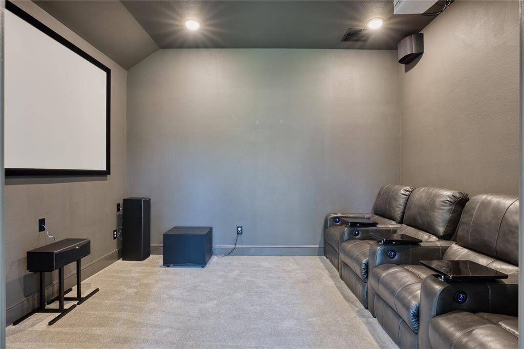 Experience the joy of having a dedicated entertainment room, designed for family and friends to enjoy anytime!