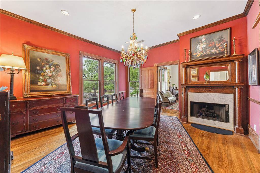 The dining room is generous with space. Entertain family and friends in this beautiful dining room with a table of 10 and a fire place.