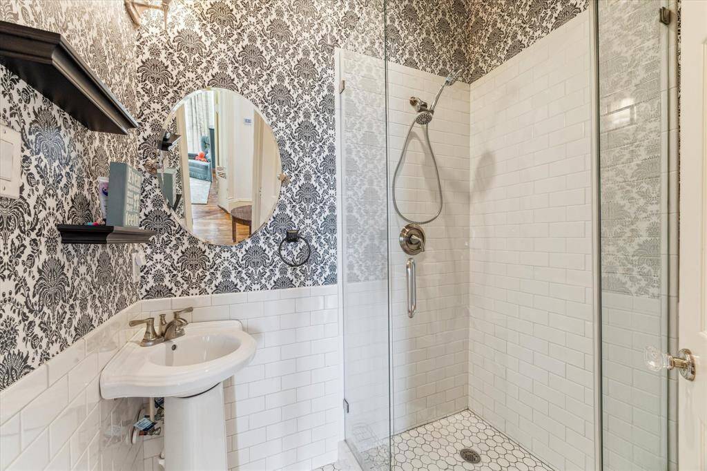 Secondary bath on the second floor offers walk in shower.