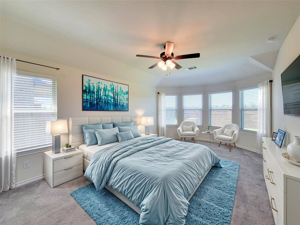 Enhanced Master Suite with a spacious bay window nook.