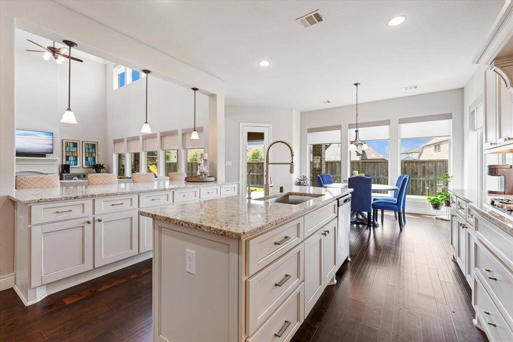Gourmet island kitchen with ample prep space and storage.