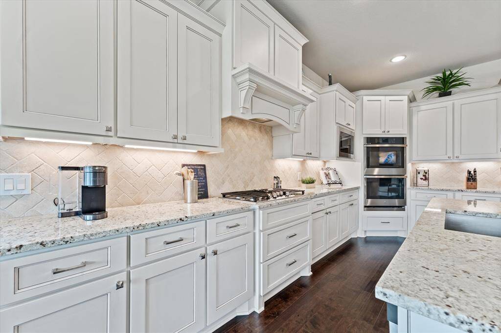 Gas cooking, high low cabinetry.