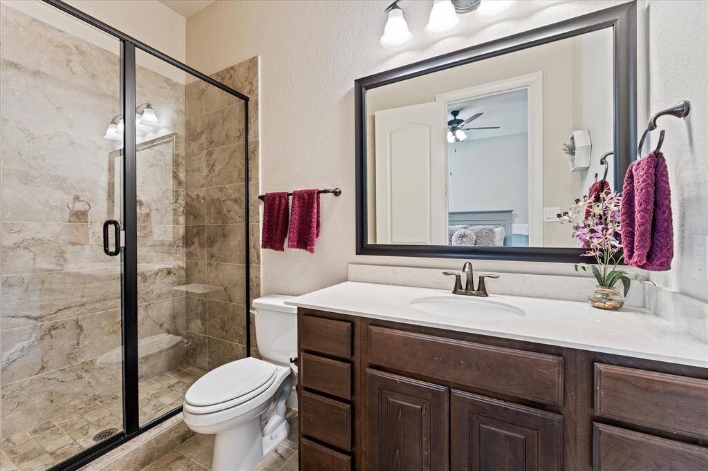 Guest suite bath with walk-in shower.