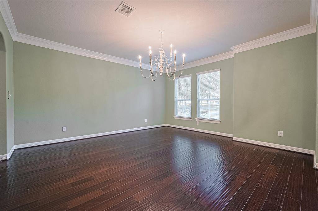 Generous formal dining with ample space for a large table and hutch or sideboard. Perfect for dinner parties!