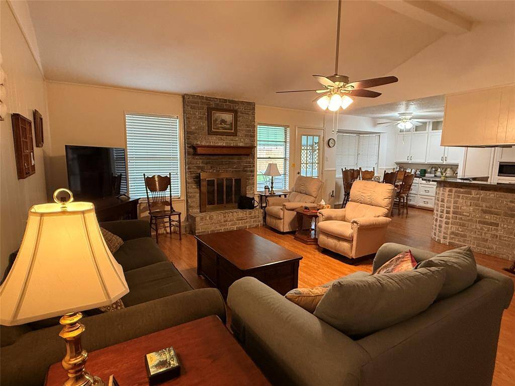 Living area, breakfast room and kitchen bar