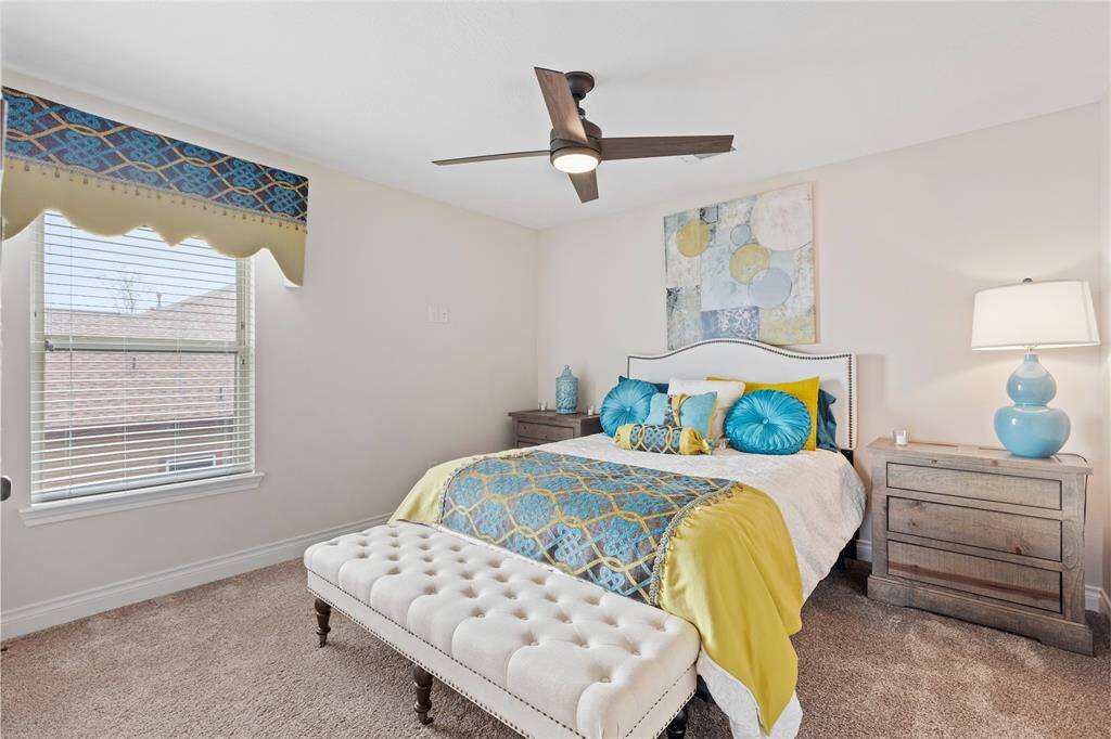 The second bedroom on the upper level offers a peaceful and comfortable space, to relax. A perfect retreat for family or guests.
