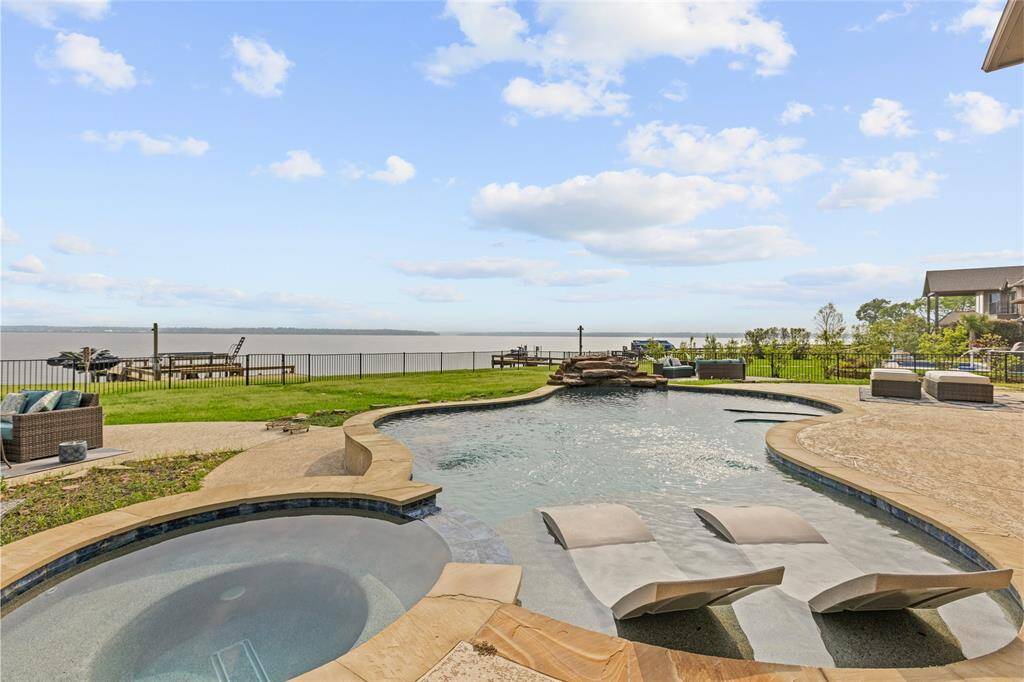 Cool off in the pool on hot summer days or take a dip during cooler months, thanks to it's heated feature, all while enjoying stunning lake views