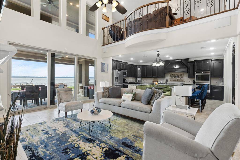 Enjoy the seamless flow between indoor and outdoor living with sliding doors that open wide, creating an effortless connection to the outdoors. The abundance of natural light fills the space, enhancing the bright, airy feel perfect for relaxing or entertaining.