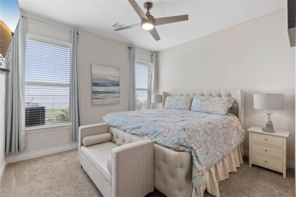 Conveniently located on the first floor, this private guest suite offers comfort and tranquility with beautiful lake views, making it the perfect retreat for family and friends.