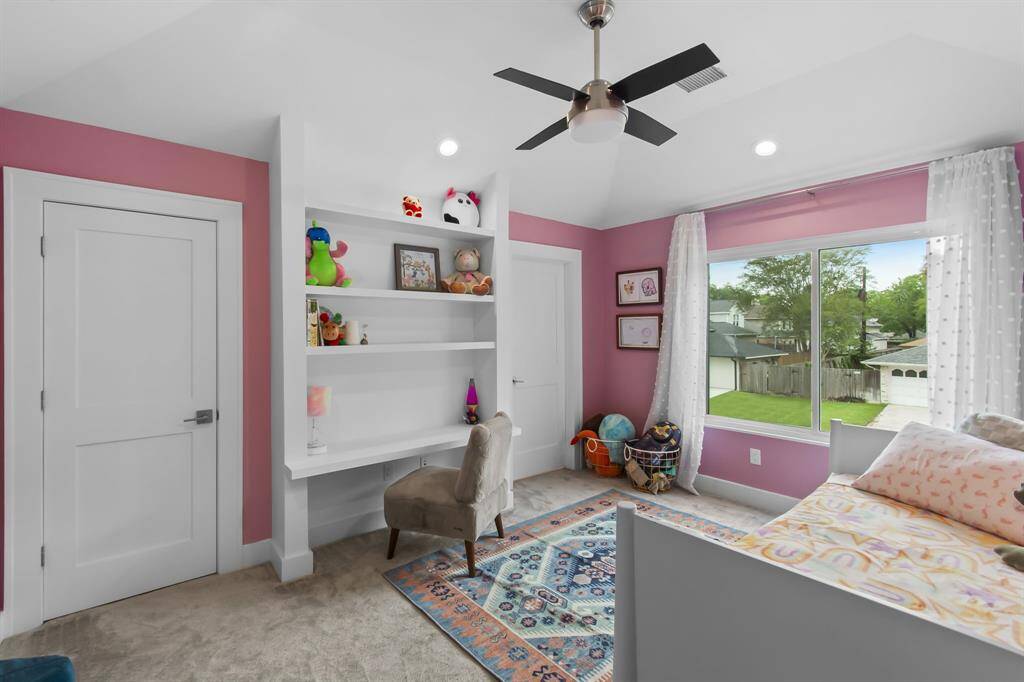 One of the two secondary bedrooms located on the second level of the home. Both bedrooms are complete with private en-suite bathrooms and generous walk-in closets.