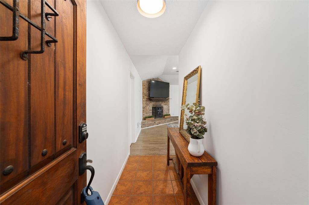 Welcoming entry hall with a warm and inviting ambiance.