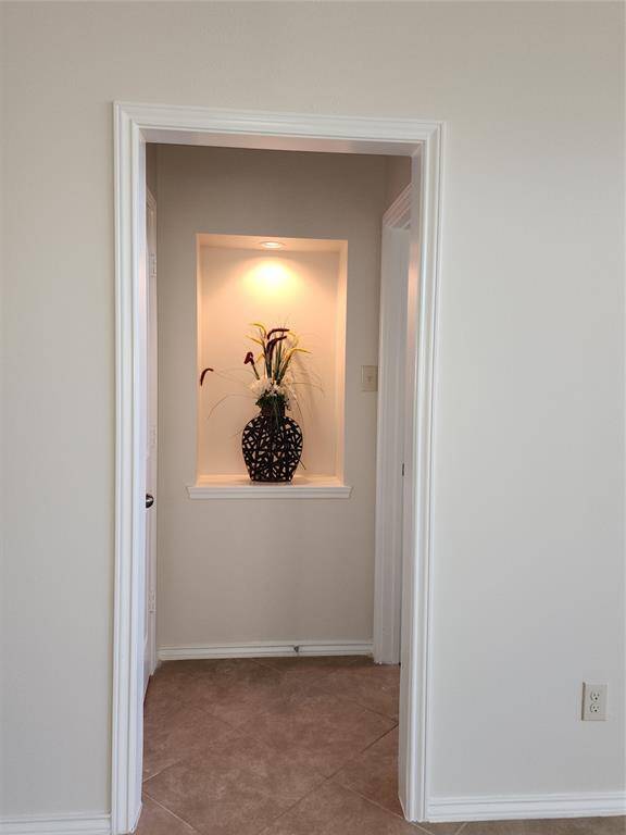 Beautifully designed Art Niche with elegant lighting, seamlessly enhancing the home's sophisticated style and charm.