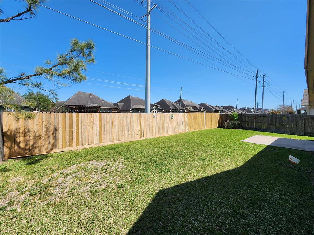Enjoy the tranquility of this home’s prime location with no rear neighbors, ensuring privacy and serenity.
