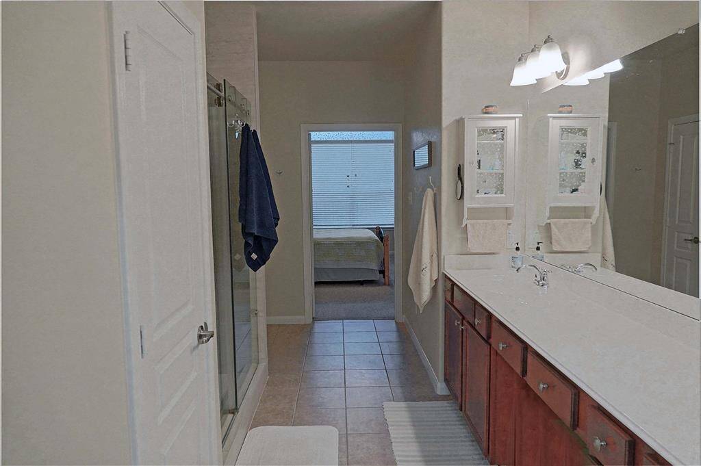 Primary bath with double sinks and large shower