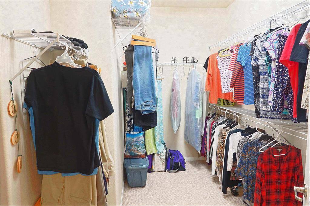 Huge walk-in closet in primary bedroom