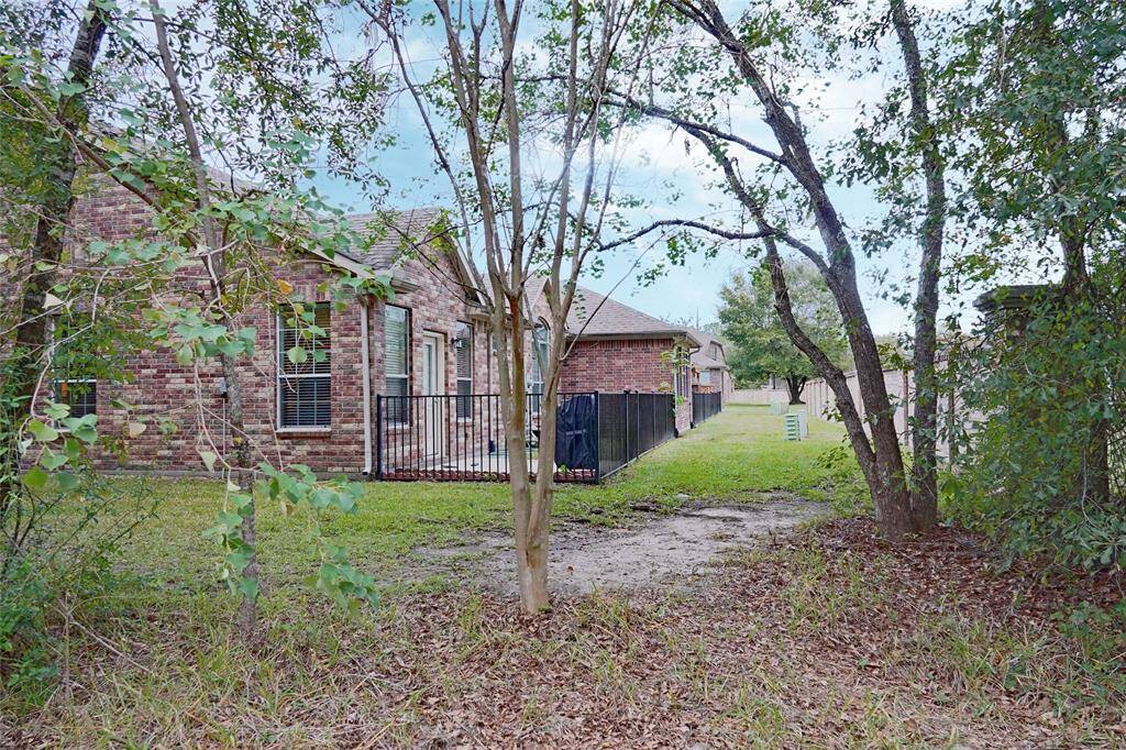 view from green area on right side of house.