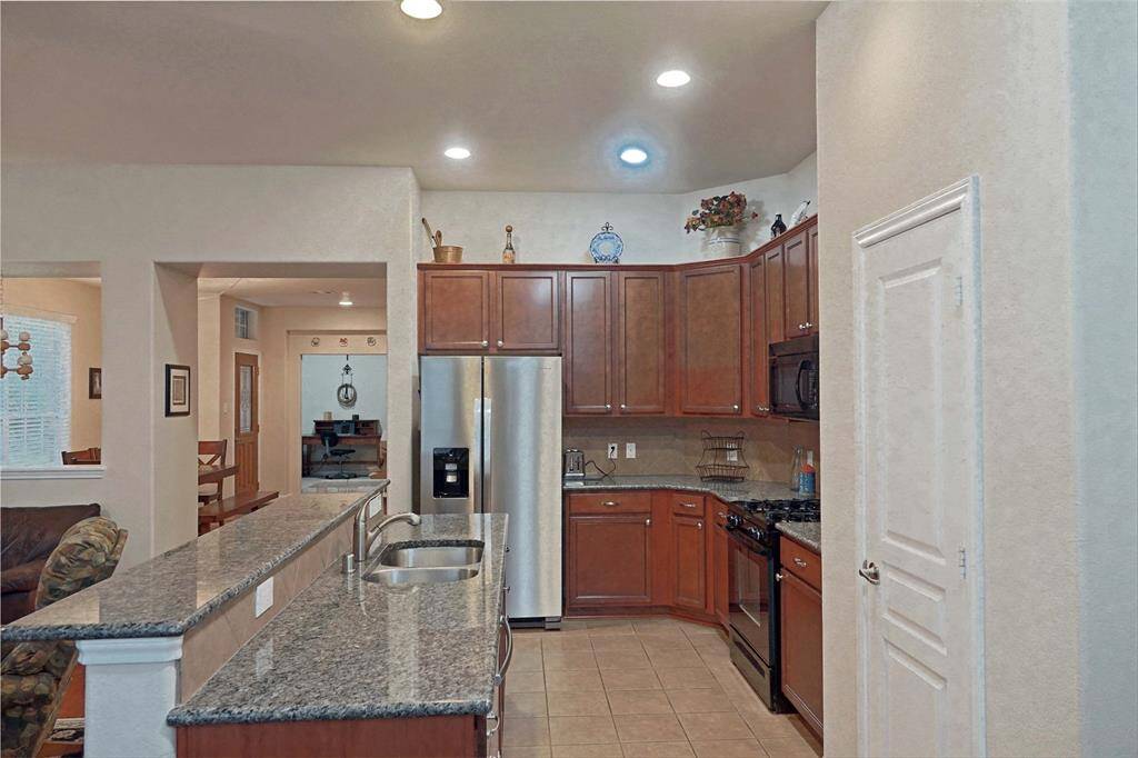 View of kitchen from breakfast area.